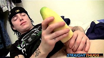 Straight tattooed thug playing with his big cock and a fruit