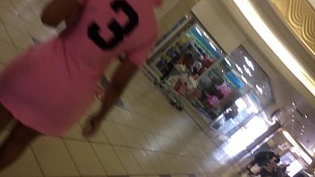 ass under pink skirt on an escalator.MOV