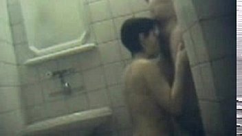 Spy cam films oral sex in the bathroom on SpyAmateur.com